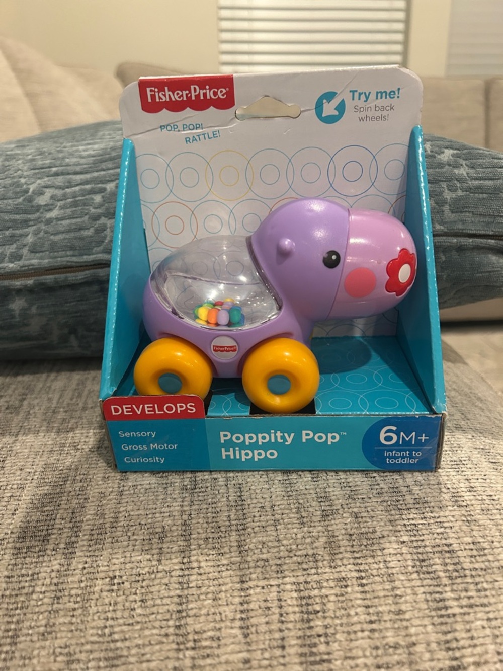 Fisher-Price Poppity Pop Hippo - Lavender Purple with Yellow Wheels